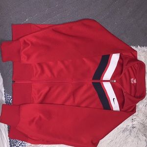 Red Nike athletic jacket